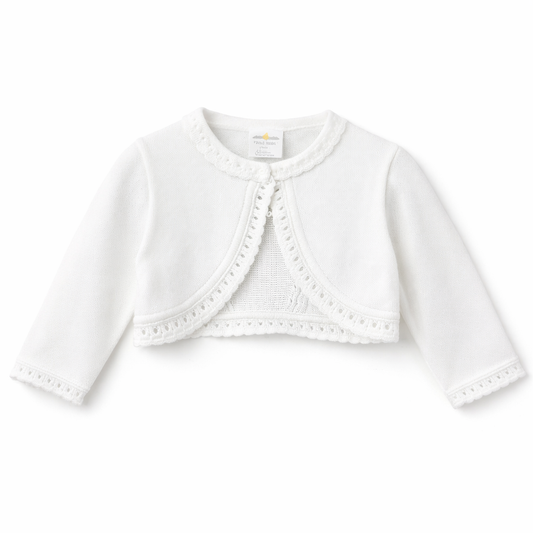 Elegant white baby bolero worn over ceremony dress